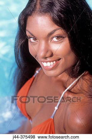 Black woman in the pool smiling View Large Photo Image Stock Photo - Black woman in the pool smiling. Fotosearch