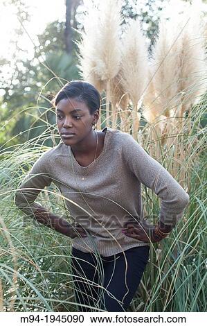 Stock Image - Black woman posing as a model.. Fotosearch