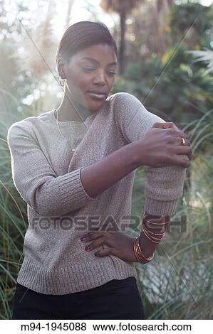 Stock Photo - Black woman posing as a model.. Fotosearch