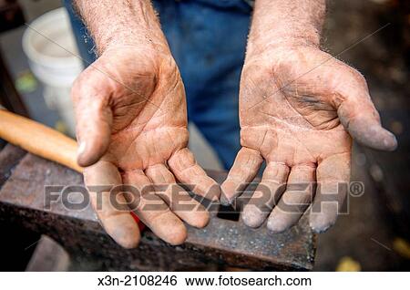 Stock Photograph - Blacksmith's hands.. Fotosearch
