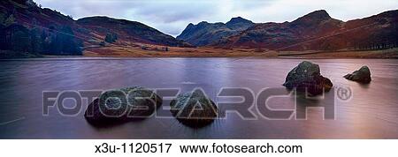 Blea Tarn and the Langdale Pikes near Little Langdale in the Lake District National Park, Cumbria, England, United Kingdom View Large Photo Image Stock Photo - Blea Tarn and the Langdale Pikes near Little Langdale in the Lake District National Park, Cumbria, England, United Kingdom. Fotosearch