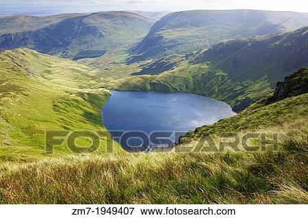 Blea Water in the Lake District from High Street with Harter Fell and Branstree in the distance. View Large Photo Image Stock Photo - Blea Water in the Lake District from High Street with Harter Fell and Branstree in the distance.. Fotosearch