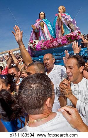 Blessing at sea Procession during annual gipsy pilgrimage at Les Saintes Maries de la Mer may, Camargue, Bouches du Rhone, France View Large Photo Image Picture - Blessing at sea Procession during annual gipsy pilgrimage at Les Saintes Maries de la Mer may, Camargue, Bouches du Rhone, France. Fotosearch
