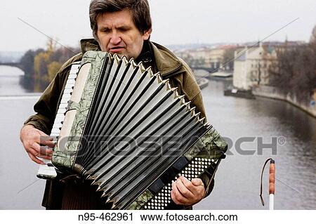 Blind accordion player on the Charles Bridge. Prague. Czech Republic. View Large Photo Image Stock Image - Blind accordion player on the Charles Bridge. Prague. Czech Republic.. Fotosearch
