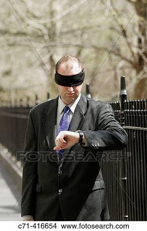Blindfolded business man View Large Photo Image Picture - Blindfolded business man. Fotosearch