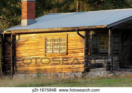 Blockhouse bathing in evening sun Vaesternorrland, Sweden View Large Photo Image Stock Photo - Blockhouse bathing in evening sun Vaesternorrland, Sweden. Fotosearch