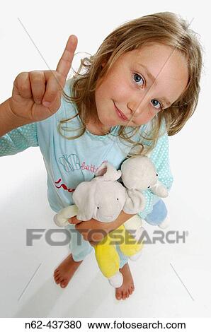 Blond child with dolls. View Large Photo Image Stock Image - Blond child with dolls.. Fotosearch