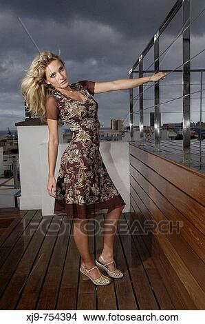 Blond girl on the terrace View Large Photo Image Picture - Blond girl on the terrace. Fotosearch