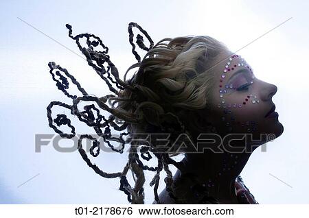 blond girl with fancy hairstyle and makeup. View Large Photo Image Stock Photograph - blond girl with fancy hairstyle and makeup.. Fotosearch