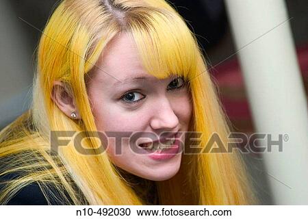 Stock Image - Blond teen girl posing. Fotosearch