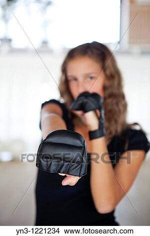 Blond woman wearing kick boxing gants View Large Photo Image Picture - Blond woman wearing kick boxing gants. Fotosearch