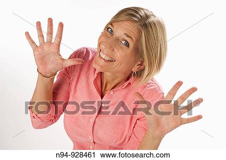 Blonde girl shaking hands with happy expression. View Large Photo Image Stock Image - Blonde girl shaking hands with happy expression.. Fotosearch
