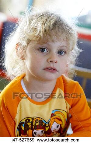 blonde hair3 year old girl looking inquisitively into camera at nursery View Large Photo Image Stock Photo - blonde hair3 year old girl looking inquisitively into camera at nursery. Fotosearch
