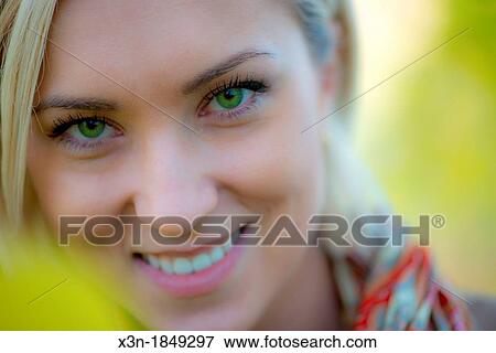 Stock Photo - Blonde haired woman outdoors. Fotosearch