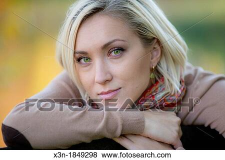Blonde haired woman outdoors View Large Photo Image Stock Photo - Blonde haired woman outdoors. Fotosearch