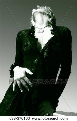 Stock Image - blonde in black bliss. Fotosearch