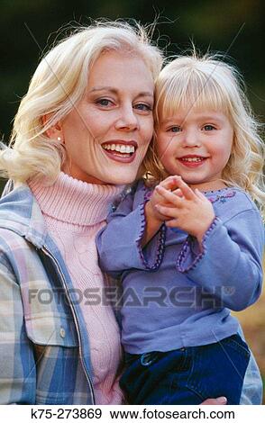 Blonde mom and daughter View Large Photo Image Stock Photo - Blonde mom and daughter. Fotosearch