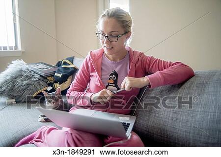 Blonde student working at computer View Large Photo Image Stock Image - Blonde student working at computer. Fotosearch