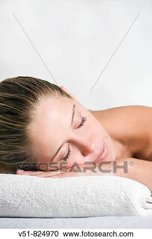 Blonde woman in a massage View Large Photo Image Stock Image - Blonde woman in a massage. Fotosearch