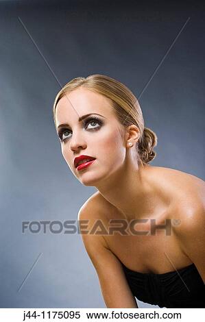 Blonde woman looking up, Portrait View Large Photo Image Stock Photography - Blonde woman looking up, Portrait. Fotosearch