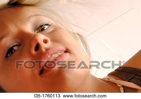 Stock Image - Blonde woman. Fotosearch