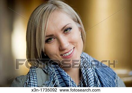 Blonde woman with green eyes View Large Photo Image Stock Image - Blonde woman with green eyes. Fotosearch