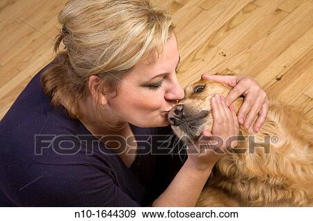 Blonde woman with her dog View Large Photo Image Stock Photo - Blonde woman with her dog. Fotosearch
