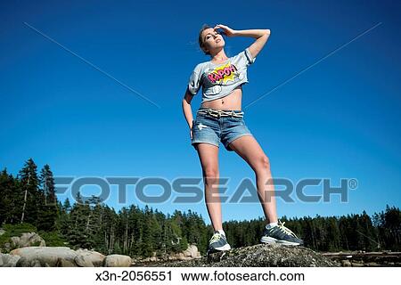 Blonde young woman on beach in Maine. View Large Photo Image Stock Image - Blonde young woman on beach in Maine.. Fotosearch