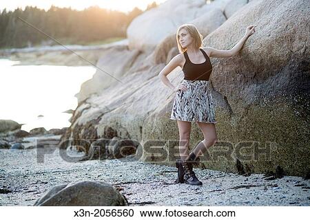 Blonde young woman on beach in Maine. View Large Photo Image Stock Image - Blonde young woman on beach in Maine.. Fotosearch