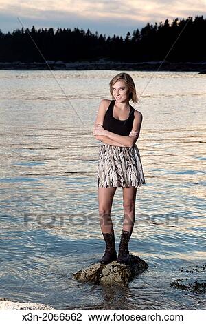 Blonde young woman on beach in Maine. View Large Photo Image Stock Image - Blonde young woman on beach in Maine.. Fotosearch