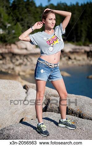 Blonde young woman on beach in Maine. View Large Photo Image Stock Image - Blonde young woman on beach in Maine.. Fotosearch