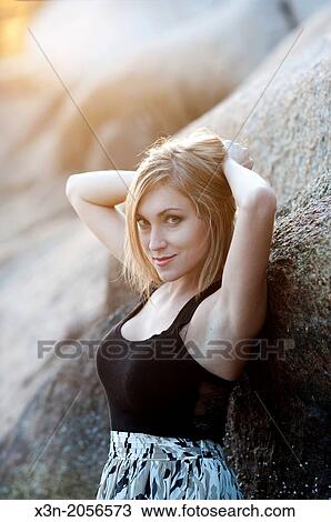 Blonde young woman on beach in Maine. View Large Photo Image Stock Image - Blonde young woman on beach in Maine.. Fotosearch