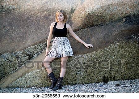 Blonde young woman on beach in Maine. View Large Photo Image Stock Photo - Blonde young woman on beach in Maine.. Fotosearch