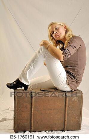 Stock Image - Blonde young woman. Fotosearch