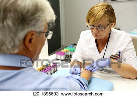 Stock Image - Blood extraction, Onkologikoa Hospital, Oncology Institute, Case Center for prevention, diagnosis and treatment of cancer, Donostia, San Sebastian, Gipuzkoa, Basque Country, Spain. Fotosearch