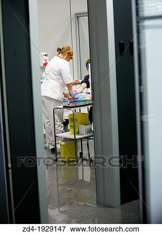 Stock Photo - Blood extraction, Onkologikoa Hospital, Oncology Institute, Case Center for prevention, diagnosis and treatment of cancer, Donostia, San Sebastian, Gipuzkoa, Basque Country, Spain. Fotosearch