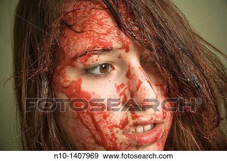 Stock Photo - Bloody teen girl. Fotosearch