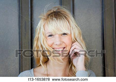 Blowing wind across her face View Large Photo Image Stock Photo - Blowing wind across her face. Fotosearch
