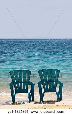 Blue Beach Chairs, Cat Island in Bahamas View Large Photo Image Stock Image - Blue Beach Chairs, Cat Island in Bahamas. Fotosearch