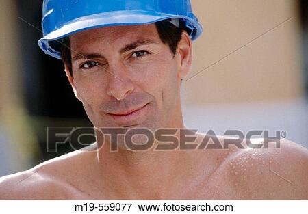 Stock Photo - blue collar worker's portrait. Fotosearch