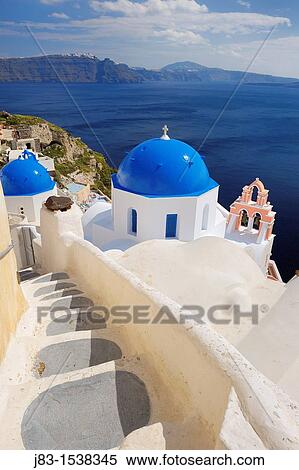 Blue domes of church in Oia village, Santorini, Aegean Island, Cyclades Island, Greek Islands, Greece, Europe View Large Photo Image Stock Photography - Blue domes of church in Oia village, Santorini, Aegean Island, Cyclades Island, Greek Islands, Greece, Europe. Fotosearch