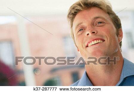 Blue eyes man portrait View Large Photo Image Stock Photo - Blue eyes man portrait. Fotosearch