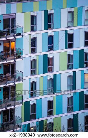 Stock Image - Blue-green front of the house flats in Bermondsey, London, UK. Fotosearch