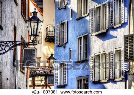 Blue house with windows, switzerland View Large Photo Image Stock Image - Blue house with windows, switzerland. Fotosearch