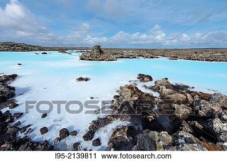 Stock Image - Blue Lagoon is a thermal resort using the hot water coming out from a geothermal power plant, Iceland (not property released).. Fotosearch
