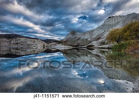 Blue Lake reflection, St Bathan? s, autumn dawn, Central Otago, New Zealand View Large Photo Image Stock Image - Blue Lake reflection, St Bathan? s, autumn dawn, Central Otago, New Zealand. Fotosearch