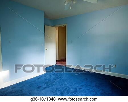 Blue painted room inside a foreclosed home in Wilson, North Carolina, United States View Large Photo Image Stock Photo - Blue painted room inside a foreclosed home in Wilson, North Carolina, United States. Fotosearch