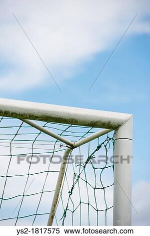 Blue sky and detail of football goal View Large Photo Image Stock Photography - Blue sky and detail of football goal. Fotosearch