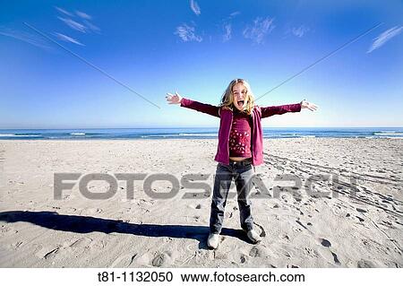 Stock Image - blue sky blond girl alone. Fotosearch