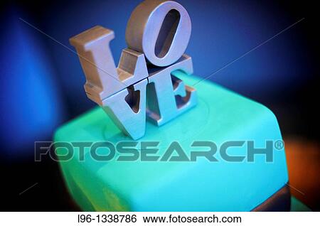 Blue wedding cake with LOVE topper View Large Photo Image Stock Photograph - Blue wedding cake with LOVE topper. Fotosearch